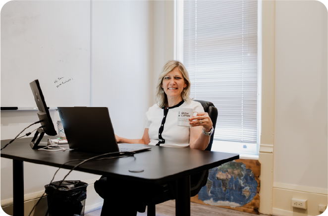 marketing-strategist-working-at-desk-office-environment