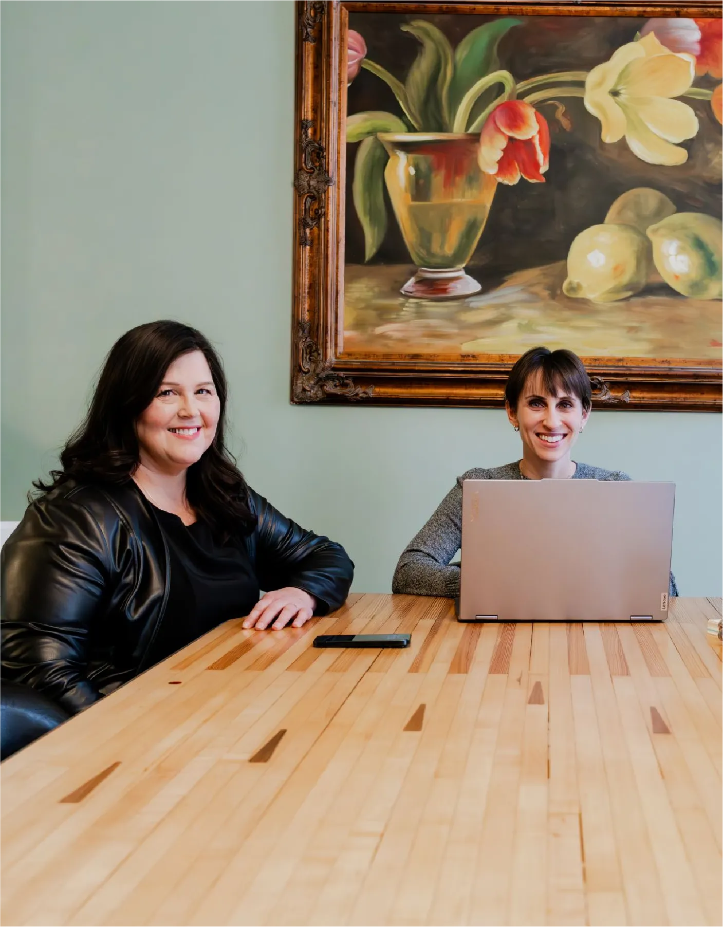 The Media Captain Google Business Profile management team at a conference table in their Columbus office The Media Captain Google Business Profile management team at a conference table in their Columbus office